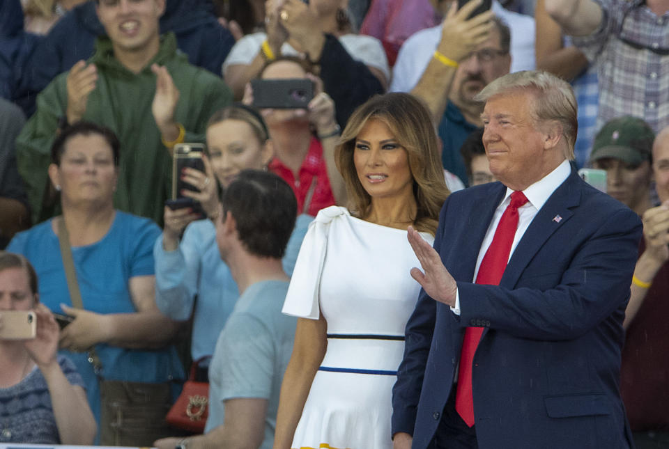 WASHINGTON, DC - JULY 04: President Donald Trump and first lady Melania Trump take the stage on July 04, 2019 in Washington, DC. President Trump is holding a "Salute to America" celebration on the National Mall on Independence Day this year with musical performances, a military flyover, and fireworks. (Photo by Tasos Katopodis/Getty Images)