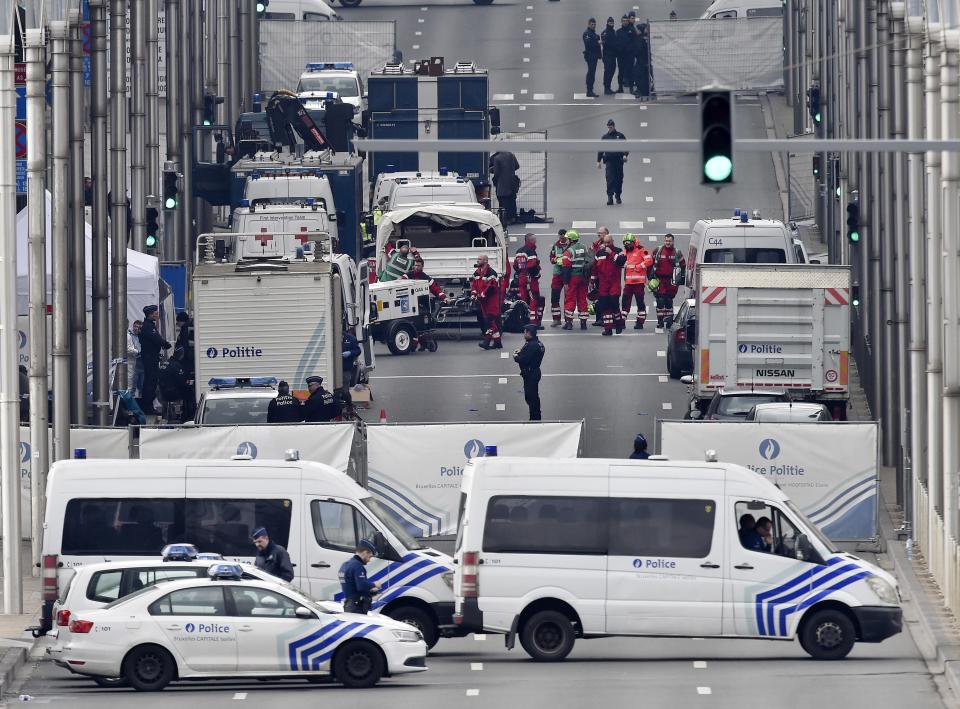 FILE - Police and rescue teams are pictured outside the metro station Maelbeek after an incident, in Brussels, Tuesday, March 22, 2016. A jury is expected to render its verdict Tuesday, July 25, 2023 over Belgium’s deadliest peacetime attack. The suicide bombings at the Brussels airport and a busy subway station in 2016 killed 32 people in a wave of violence in Europe claimed by the Islamic State group. Among the 10 defendants is Salah Abdeslam, serving a life sentence in France over his role in 2015 Paris attacks. (AP Photo/Martin Meissner, File)