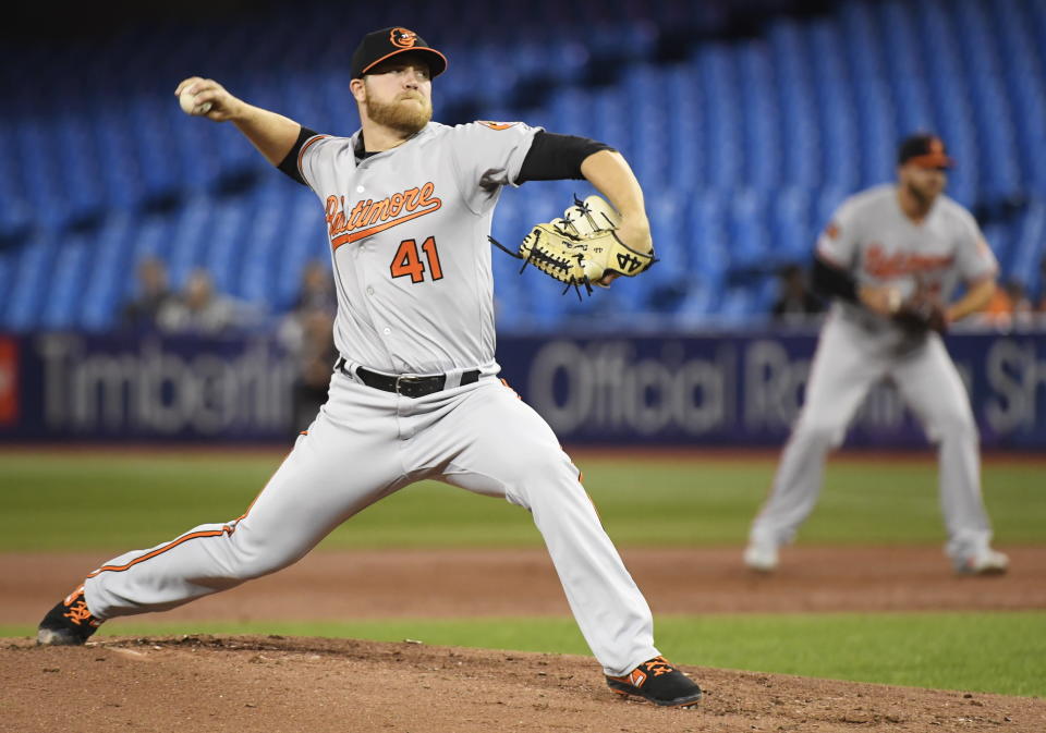 Baltimore Orioles starting pitcher David Hess (41) works against the Toronto Blue Jays during first-inning baseball game action in Toronto, Monday, April 1, 2019. (Nathan Denette/The Canadian Press via AP)