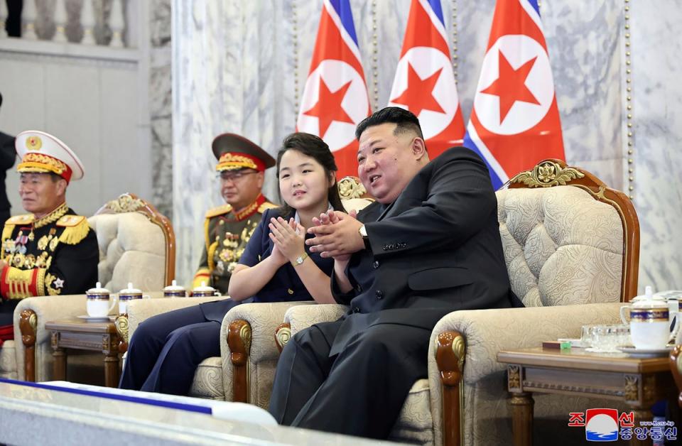 Kim Jong-un and his daughter attend a paramilitary parade ceremony in September, marking North Korea’s 75th founding anniversary in Pyongyang (KCNA via KNS)