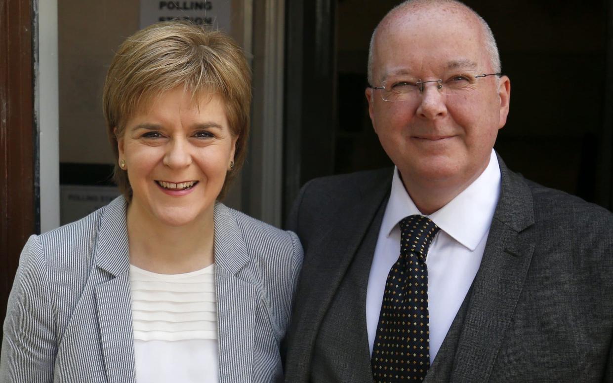 Nicola Sturgeon and husband Peter Murrell - PA