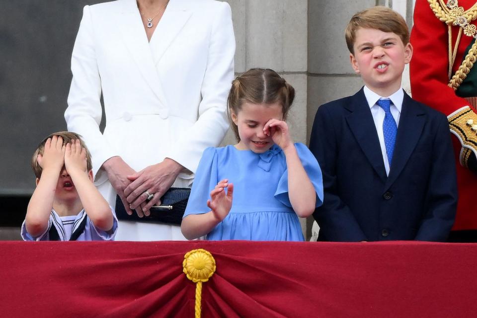 PHOTO: The Royal children react as they watch a special flypast from Buckingham Palace balcony following the Queen's Birthday Parade, the Trooping the Color, as part of Queen Elizabeth II's platinum jubilee celebrations, in London, June 2, 2022. (Daniel Leal/AFP via Getty Images)