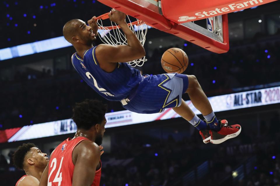 Chris Paul of the Oklahoma City Thunder dunks during the first half of the NBA All-Star basketball game Sunday, Feb. 16, 2020, in Chicago. (AP Photo/Nam Huh)