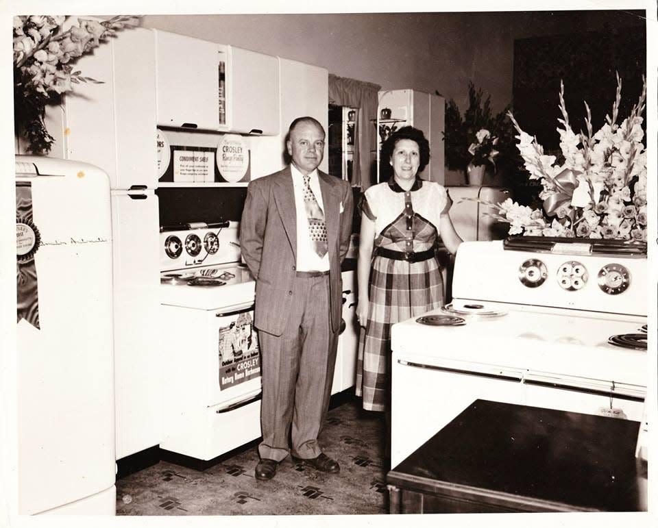 Ernie and Verna Hartman at their appliance store at 205 Fifth Ave., Ellwood City.