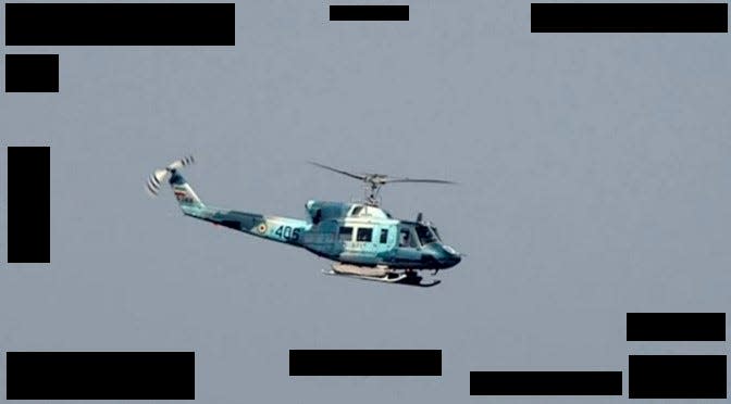 An undated still image released on Oct. 6 from video taken by an Arabian Fox MAST-13 unmanned surface vessel of an Iranian Navy AB-212 helicopter in the Strait of Hormuz.