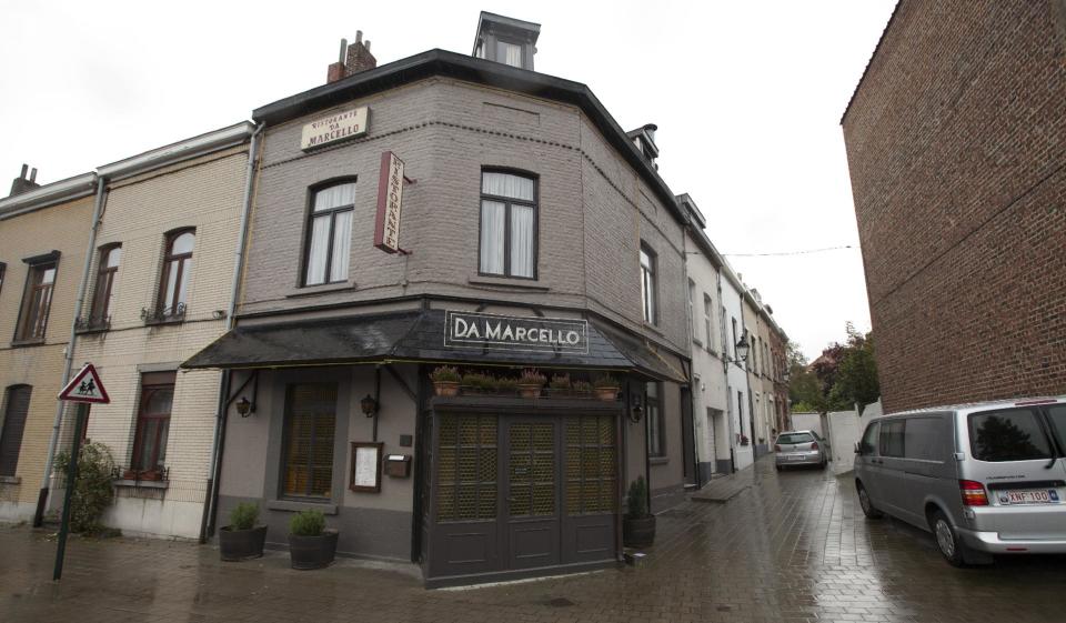 The restaurant Da Marcello is seen in Neder-over-Heembeek, Belgium on Friday, Oct. 26, 2012. Belgian authorities are seeking the public’s help in solving the killing of an executive for ExxonMobil, the world's largest oil company, who was shot to death in front of his wife nearly two weeks ago on a street in a suburb of the Belgian capital of Brussels. Nicholas Mockford, a British national, was shot on Oct. 14 as he left the Italian restaurant in Neder-over-Heembeek. Belgian authorities declined to provide information on the crime, which they said was common in investigations of serious crimes. (AP Photo/Virginia Mayo)