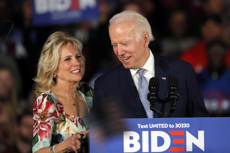 FILE - In this Feb. 29, 2020 file photo, Democratic presidential candidate former Vice President Joe Biden, accompanied by his wife Jill Biden, speaks at a primary night election rally in Columbia, S.C. Jill Biden is a prankster. The Democratic Party’s attempt to adapt its typical convention rituals to a pandemic-induced virtual affair will be put through its paces Tuesday night. (AP Photo/Gerald Herbert, File)