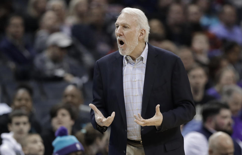 San Antonio Spurs head coach Gregg Popovich argues a call during the first half of an NBA basketball game against the Charlotte Hornets in Charlotte, N.C., Tuesday, March 26, 2019. (AP Photo/Chuck Burton)