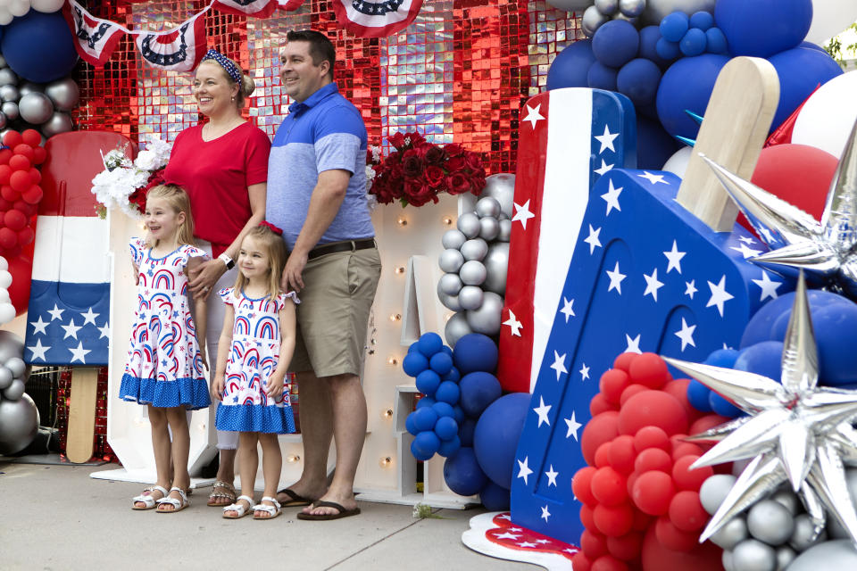 The Walker family poses for a photo before the annual South Montgomery County 4th of July Parade at Market Street, Tuesday, July 4, 2023, in The Woodlands, Texas. (Jason Fochtman/Houston Chronicle via AP)