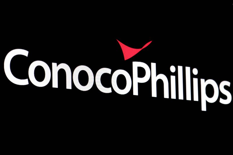 FILE PHOTO: A screen displays the logo for ConocoPhillips on the floor of the NYSE in New York