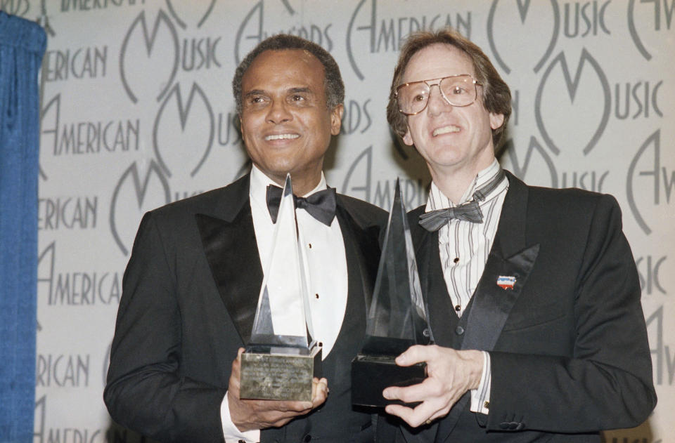 (L-R) Harry Belafonte and Ken Kragen in 1986 at American Music Awards - Credit: AP