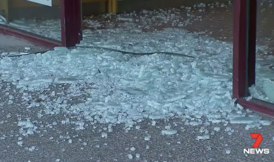 The gang smashed through the doors of the bakery. Photo: 7 News