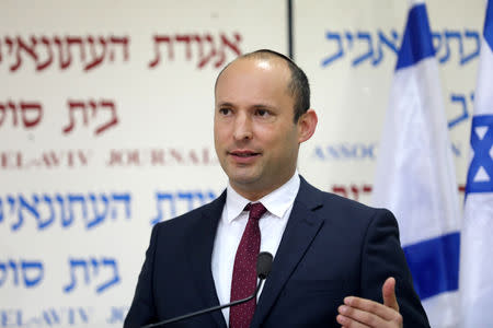 Israeli Education Minister Naftali Bennett, from the Jewish Home party, delivers a statement in Tel Aviv, Israel December 29, 2018. REUTERS/Corinna Kern
