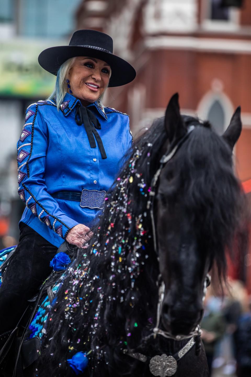 Tanya Tucker rides the horse “Lauwe The Magnificent” from the Country Music Hall of Fame to Lower Broadway to announce her upcoming Ryman performances Monday, April 3, 2023.