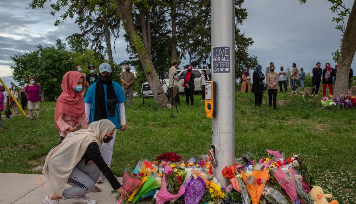 <span class="caption">Mourners gather at the site of the attack on a Muslim family in London, Ontario. After tragedy, there is no one way to recover from trauma.</span> <span class="attribution"><span class="source">THE CANADIAN PRESS/Brett Gundlock</span></span>