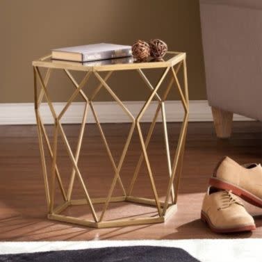 Get it on <a href="https://jet.com/product/Pemberly-Row-Geometric-Accent-End-Table-in-Gold/a22e700176cf4ae380a042826d664815" target="_blank">Jet</a>.&nbsp;