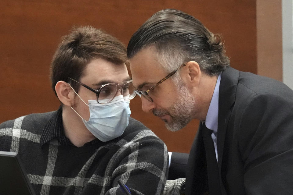 FILE - Marjory Stoneman Douglas High School shooter Nikolas Cruz speaks with Capital defense attorney Casey Secor during the penalty phase of his trial at the Broward County Courthouse in Fort Lauderdale, Fla., on Aug. 17, 2022. Attorneys for Florida school shooter Nikolas Cruz are about to present their case Monday, Aug. 22 2022, for why they believe he should be sentenced to life in prison and not death. (Amy Beth Bennett/South Florida Sun Sentinel via AP, Pool, File)