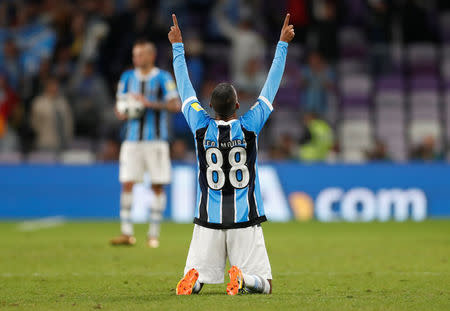 Soccer Football - FIFA Club World Cup Semi Final - Gremio FBPA vs CF Pachuca - Hazza Bin Zayed Stadium, Al Ain City, United Arab Emirates - December 12, 2017 Gremio’s Leo Moura celebrates after the match REUTERS/Matthew Childs