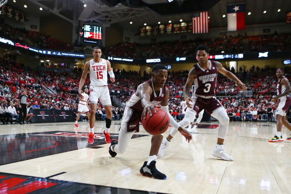 Jan 29, 2022; Lubbock, Texas, USA;  Mississippi State Bulldogs guard Iverson Molinar (1) goes after a loose ball against Texas Tech Red Raiders guard Kevin McCullar (15) in the first half at United Supermarkets Arena. Mandatory Credit: Michael C. Johnson-USA TODAY Sports