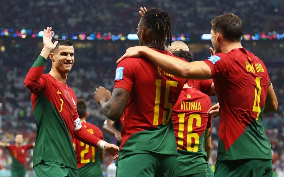 Portugal's Rafael Leao celebrates scoring their sixth goal with Cristiano Ronaldo - REUTERS