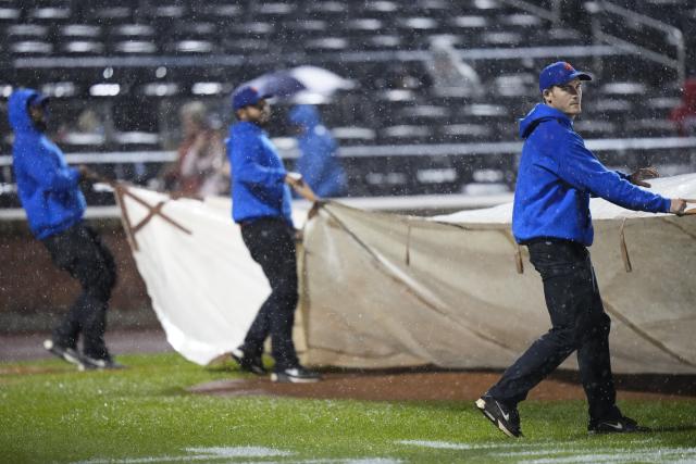Marlins, rally for lead in ninth inning vs. Mets, but downpour forces  suspension before game's end