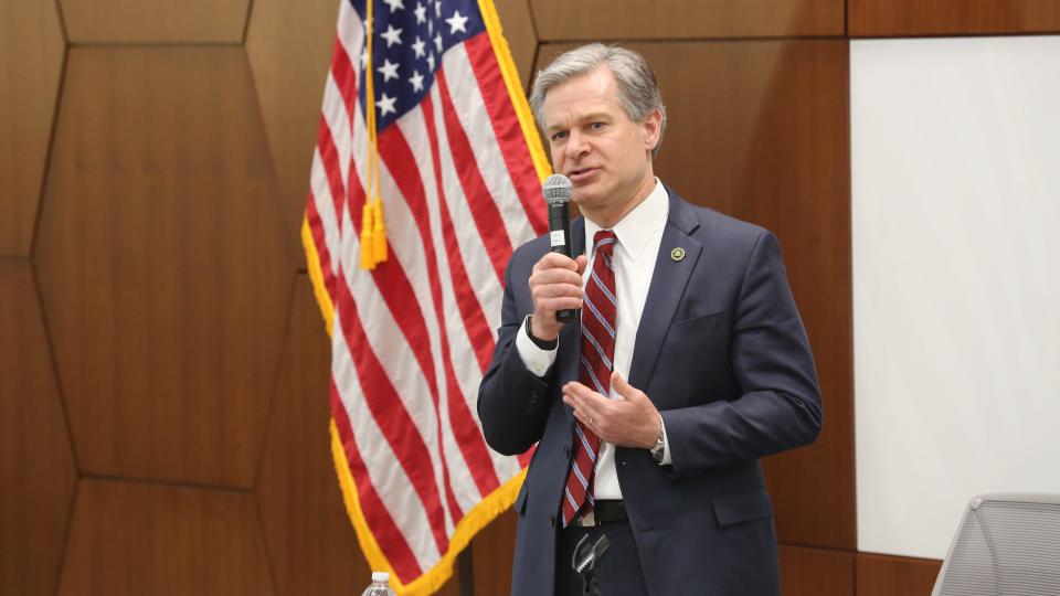 FBI Director Christopher Wray addressed cyber threats when speaking with top law enforcement officials at a Kansas Bureau of Investigation town hall in March.