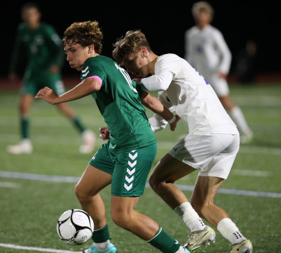 Cornwall's Slav Mishkovski draws away from Goshen's Vincent Maviglia during the Section 9 Class AA championship on October 30, 2023.