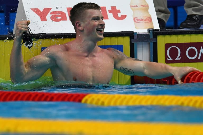 Great Britain's Adam Peaty celebrates a new world record in the men's 50m breaststroke semi-final during the swimming competition at the 2017 FINA World Championships in Budapest, on July 25, 2017