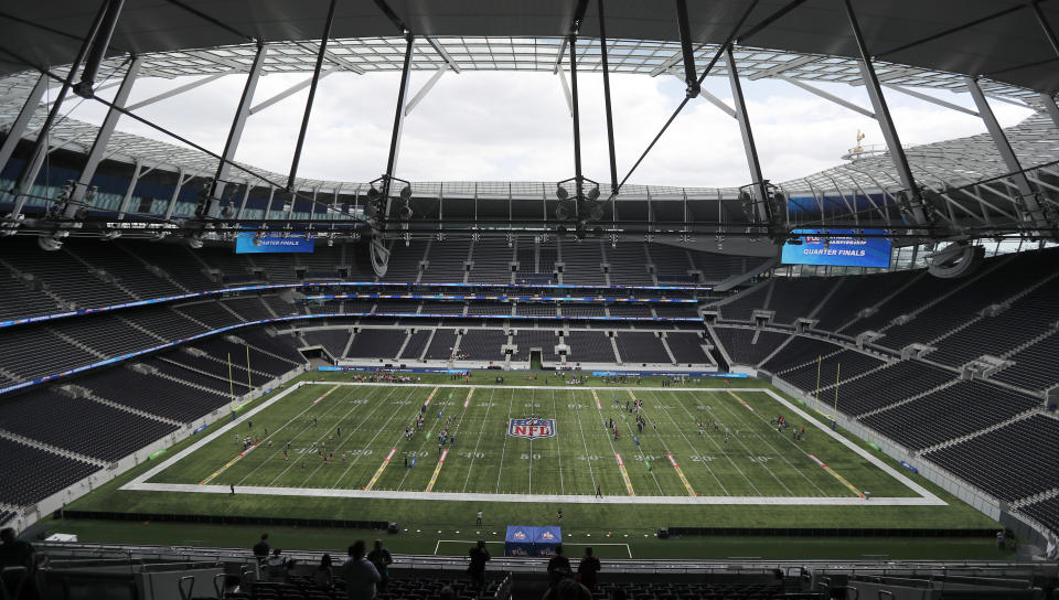 General view at the NFL pitch during the final tournament for the UK's NFL Flag Championship, featuring qualifying teams from around the country, at Tottenham Hotspur Stadium in London, Wednesday, July 3, 2019. The new stadium will host its first two NFL London Games later this year when the Chicago Bears face the Oakland Raiders and the Carolina Panthers take on the Tampa Bay Buccaneers.(AP Photo/Frank Augstein)