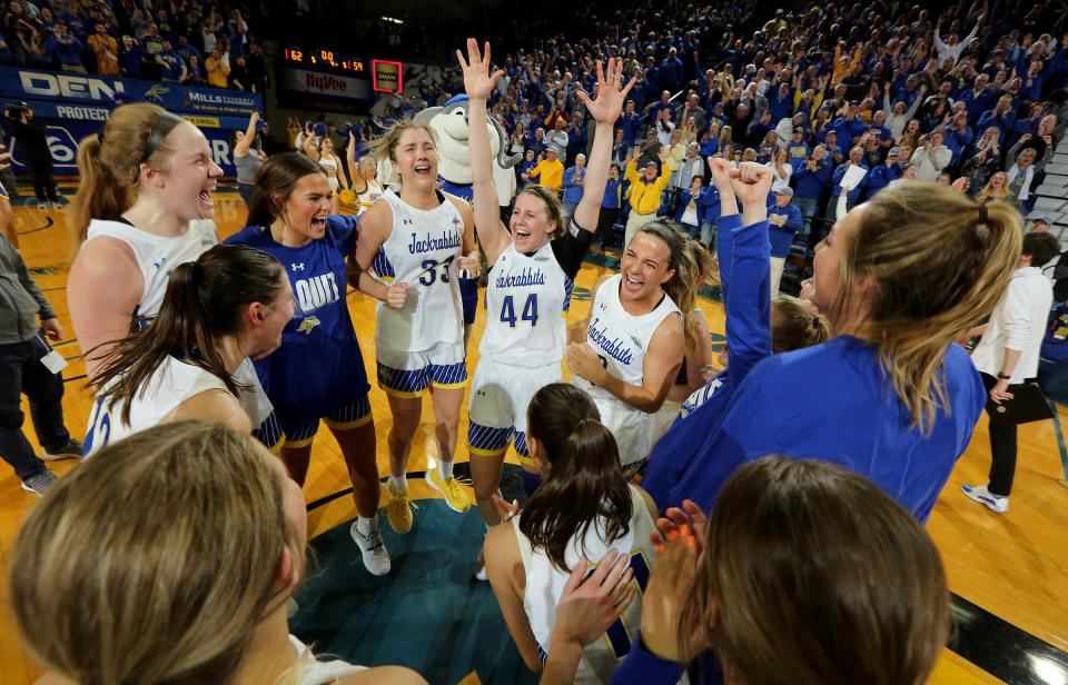 Myah Selland #44 of the South Dakota State Jackrabbits celebrates their 62-59 win over UCLA Bruins following their WNIT semifinal game at Frost Arena on March 31, 2022 in Brookings, South Dakota.