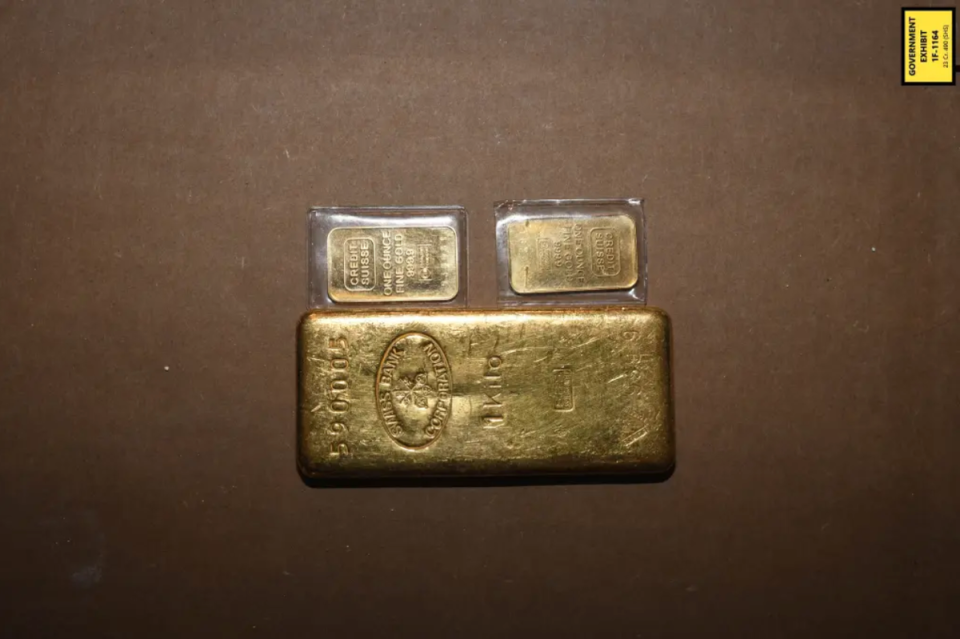 A total of 13 gold bars were found by FBI agents during raids on the home, as well as over $480,000 in cash (FBI)