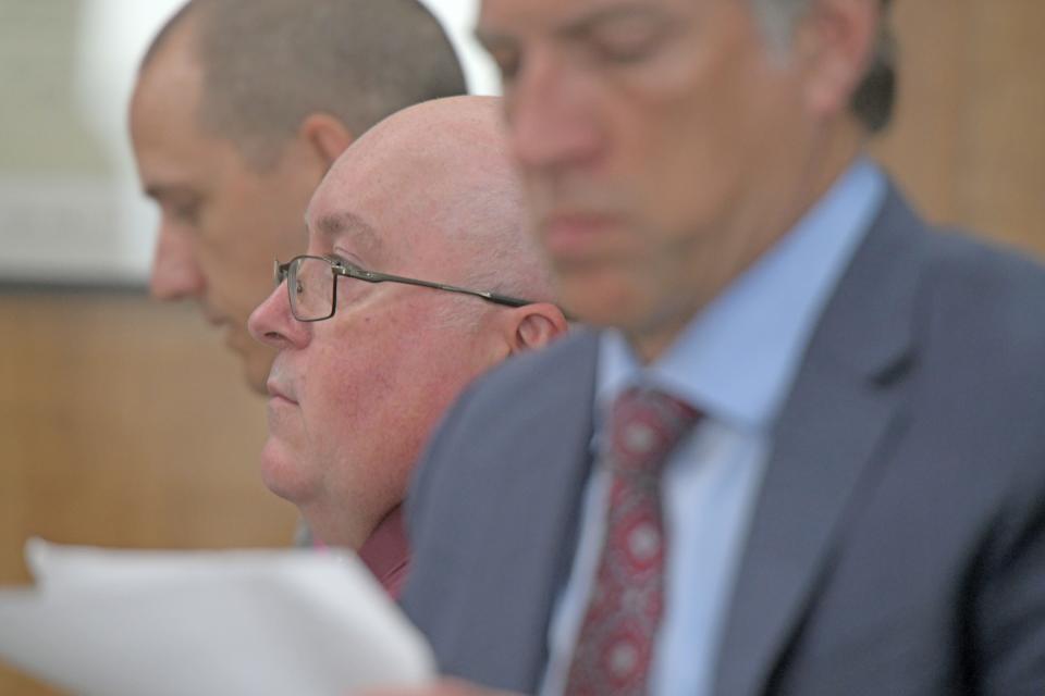 Mark Cooper appears in court Tuesday morning with his attorneys Sean Boone and James Mayer III.