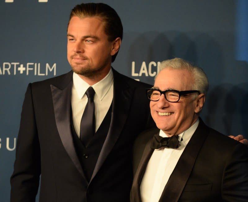 Leonardo DiCaprio and Martin Scorsese at a Los Angeles County Museum of Art event, November 2013. DiCaprio reportedly turned over to American investigators an Oscar won by Marlon Brando gifted to him by movie producers Red Granite in 2017. — AFP pic