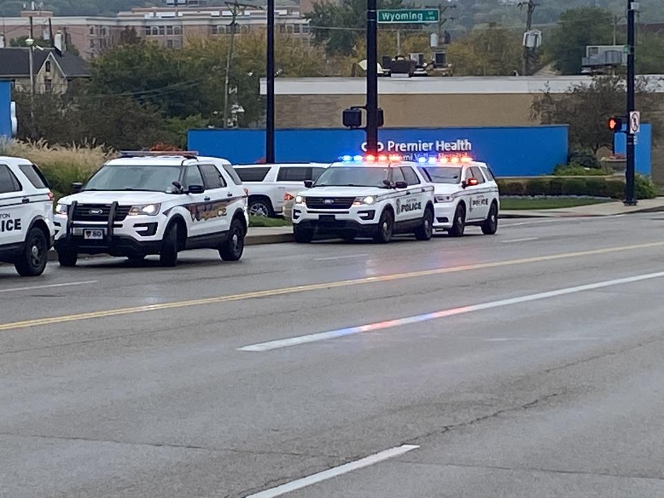 A Dayton officer was reportedly struck by a vehicle while responding to a crash Thursday afternoon.