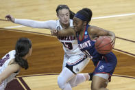 Belmont's Destinee Wells (11) drives against Gonzaga's Cierra Walker (13) during the second half of a college basketball game in the first round of the NCAA women's tournament at University Events Center in San Marcos, Texas, Monday, March 22, 2021. (AP Photo/Chuck Burton)