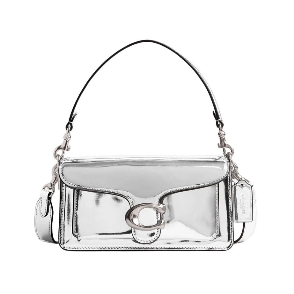 <p><a href="https://go.redirectingat.com?id=74968X1596630&url=https%3A%2F%2Fwww.coach.com%2Fproducts%2Ftabby-shoulder-bag-20-in-metallic%2FCM539-LHSLV.html%3FCOHNA%3Dtrue%26cid%3DS_GPLACM539%26ogmap%3DPLA%257CACQ%257CGOOG%257CSTND%257Cc%257CSITEWIDE%257CRetail%257CCoach_RTL_Google_PLA_Signal_NA_Generic_National_Pmax_Shine_Test%257CShopping_Smart_Generic%257C%257C19760004413%257C%257CUS%26gad_source%3D1%26gclid%3DCjwKCAiAxaCvBhBaEiwAvsLmWFkcYKkX5E2kdSuf3f5byTa758y98Q5vmn3CrtPMGmdIeK4vUNFo1RoCiKsQAvD_BwE&sref=https%3A%2F%2Fwww.elle.com%2Ffashion%2Fshopping%2Fg60114249%2Fbest-metallic-bags%2F" rel="nofollow noopener" target="_blank" data-ylk="slk:Shop Now;elm:context_link;itc:0;sec:content-canvas" class="link ">Shop Now</a></p><p>Tabby Shoulder Bag 20 </p><p>Coach</p><p>$395.00</p>