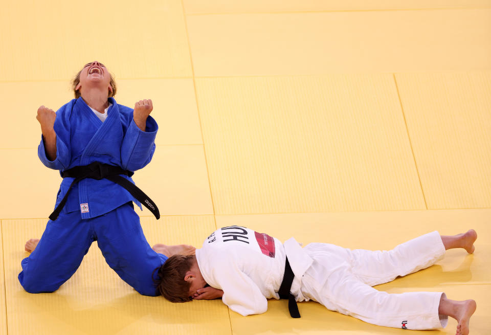 <p>TOKYO, JAPAN - JULY 25: Odette Giuffrida of Team Italy celebrates after defeating Reka Pupp of Team Hungary during the Womenâs Judo 52kg Contest for Bronze Medal A on day two of the Tokyo 2020 Olympic Games at Nippon Budokan on July 25, 2021 in Tokyo, Japan. (Photo by Harry How/Getty Images)</p> 