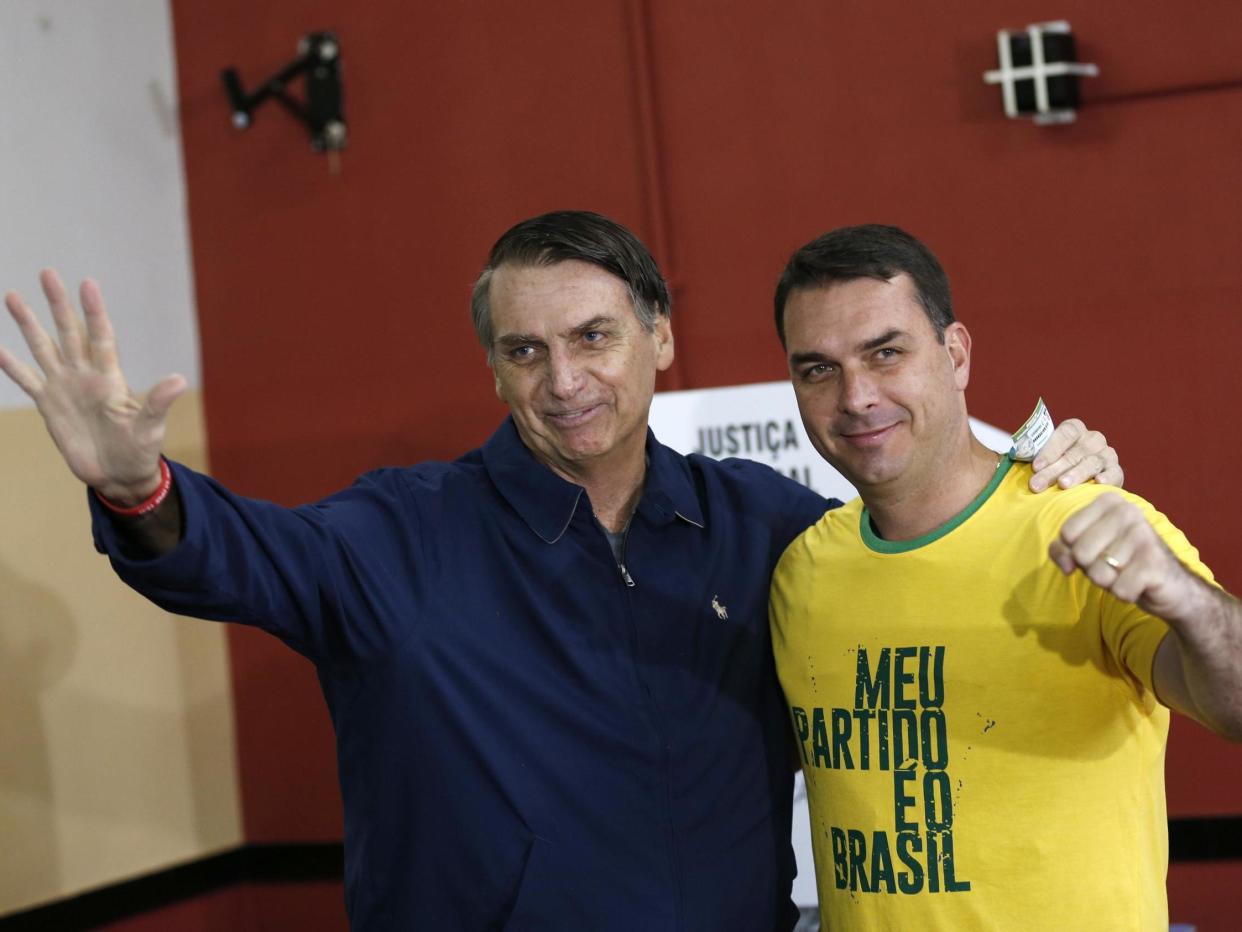 Jair and Flavio Bolsanoro in October 2018: AP