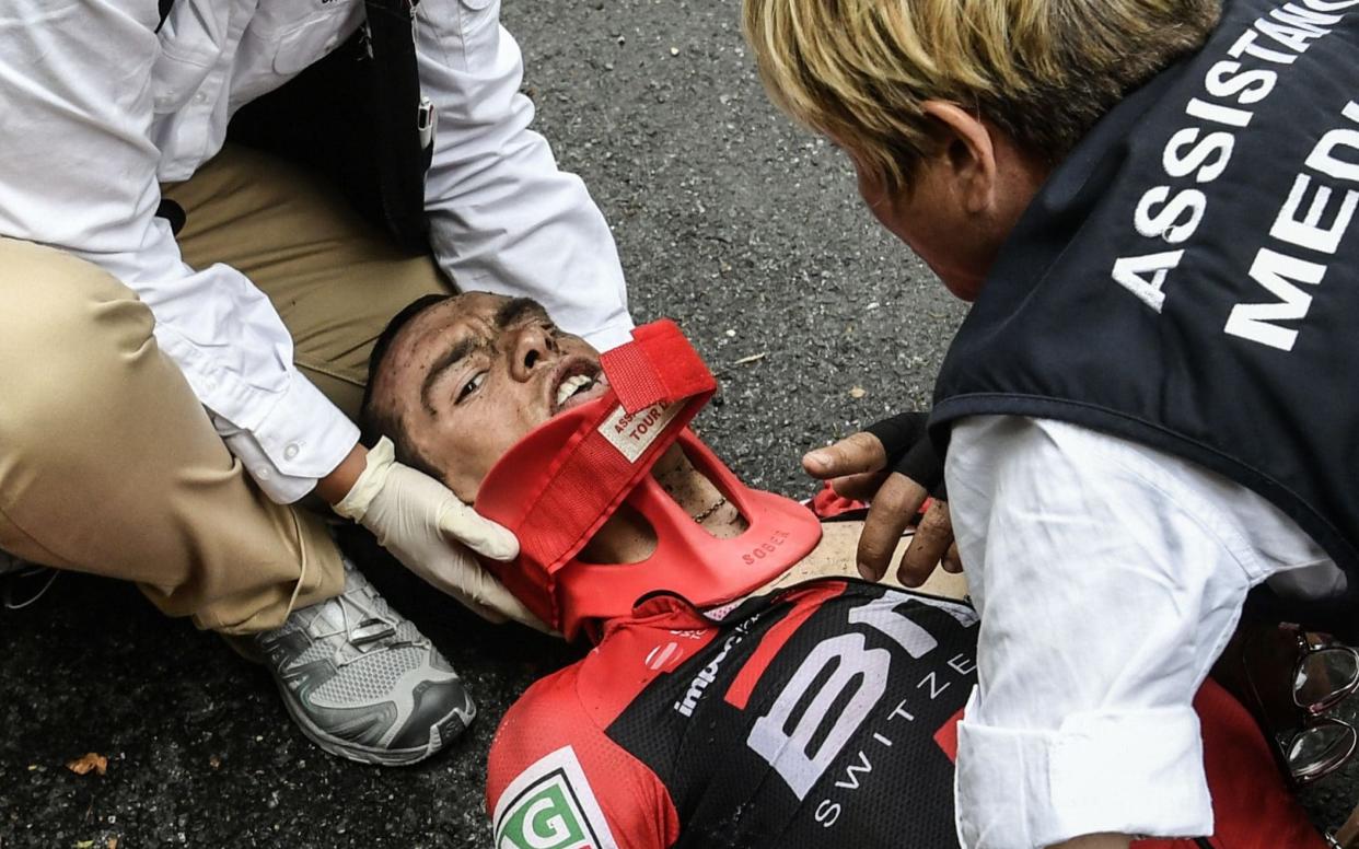Richie Porte left the Tour de France in an ambulance after crashing during stage nine - AFP