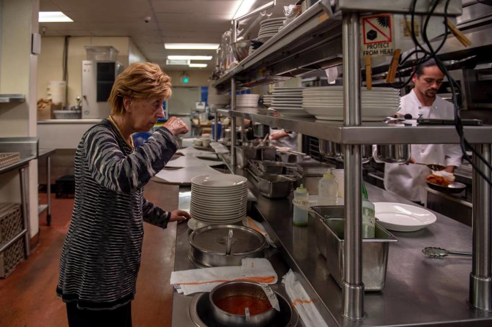 Biba Caggiano visits her restaurant’s kitchen for a taste test in 2018.