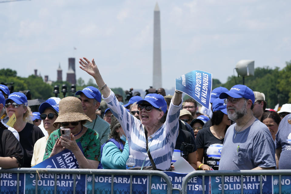 FILE - People attend the "NO FEAR: Rally in Solidarity with the Jewish People" event in Washington, on July 11, 2021, co-sponsored by the Alliance for Israel, Anti-Defamation League, American Jewish Committee, B'nai B'rith International and other organizations. More than 250 Holocaust survivors have joined an international initiative to share their stories of loss and survival with students around the world during a time of rising antisemitism following the Oct. 7 Hamas attack on Israel that triggered the war in the Gaza Strip. The Survivor Speakers Bureau was launched Thursday by the New York-based Conference on Jewish Material Claims Against Germany, also referred to as the Claims Conference. (AP Photo/Susan Walsh, File)