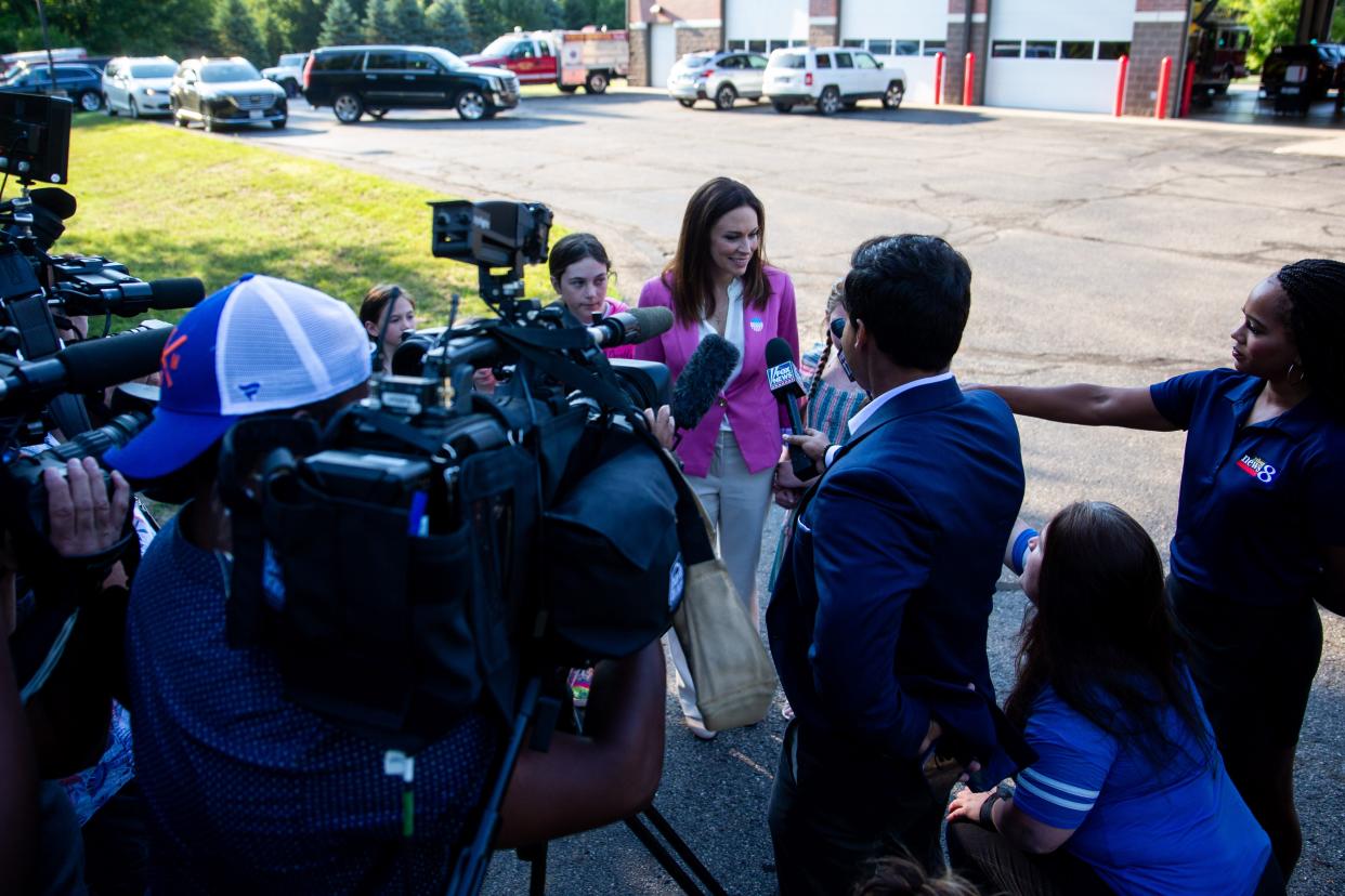 Republican candidate for Michigan governor Tudor Dixon answers questions from the press after casting her ballot in the Michigan gubernatorial primary Tuesday, Aug. 2, 2022, in Norton Shore. 