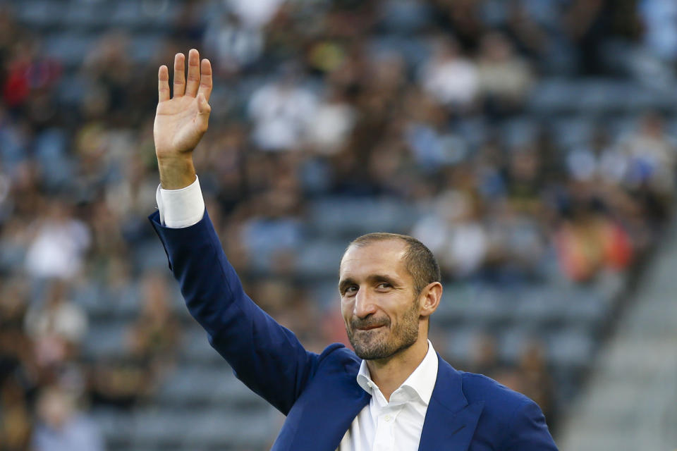 Los Angeles FC defender Giorgio Chiellini waves prior to the team's MLS soccer match against FC Dallas in Los Angeles, Wednesday, June 29, 2022. (AP Photo/Ringo H.W. Chiu)