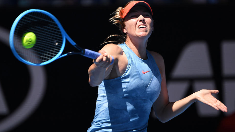 Maria Sharapova in action. (Photo by WILLIAM WEST/AFP/Getty Images)