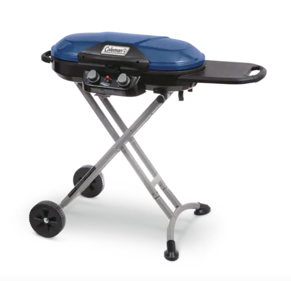 Coleman Excursion Portable 2-Burner Propane Gas BBQ Grill with a Folding Stand (Photo via Canadian Tire)