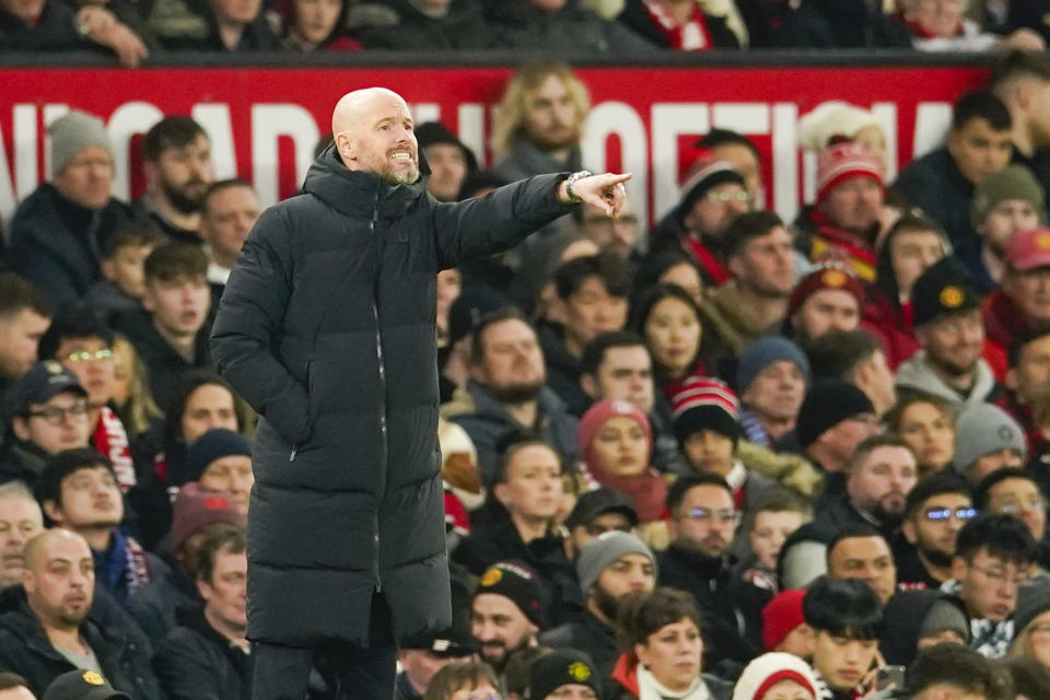 Manchester United's head coach Erik ten Hag points his finger during the English Premier League soccer match between Manchester United and Aston Villa at the Old Trafford stadium in Manchester, England, Tuesday, Dec. 26, 2023. (AP Photo/Dave Thompson)