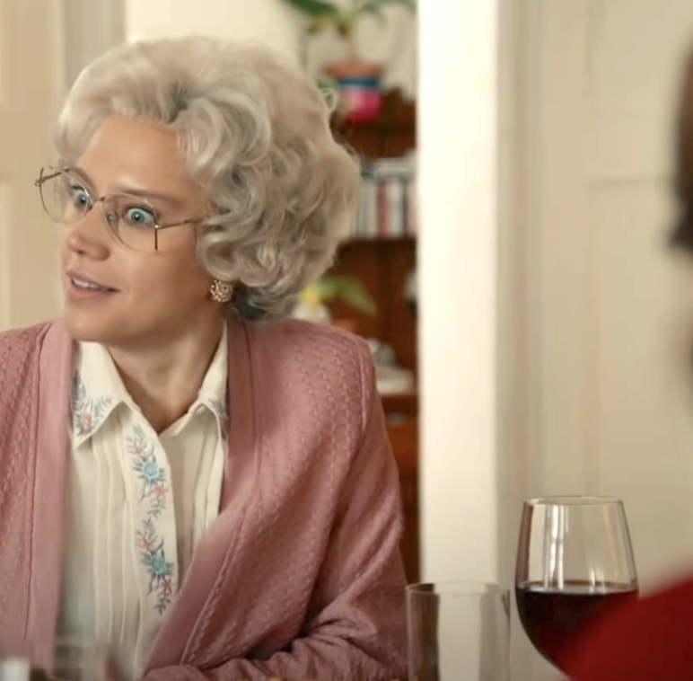 grandma looking wide-eyed at thanksgiving dinner