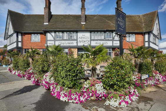 Paul Fox runs three pubs in North London, including the Arnos Arms (pictured). He says he has so far been met with ‘radio silence’ from his insurer (Arnos Arms)