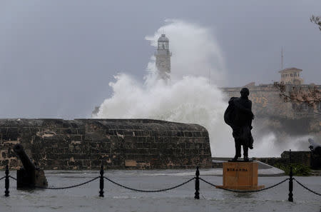 Waves crash against the lighthouse after the passing of Hurricane Irma, in Havana, Cuba, September 10, 2017. REUTERS/Stringer