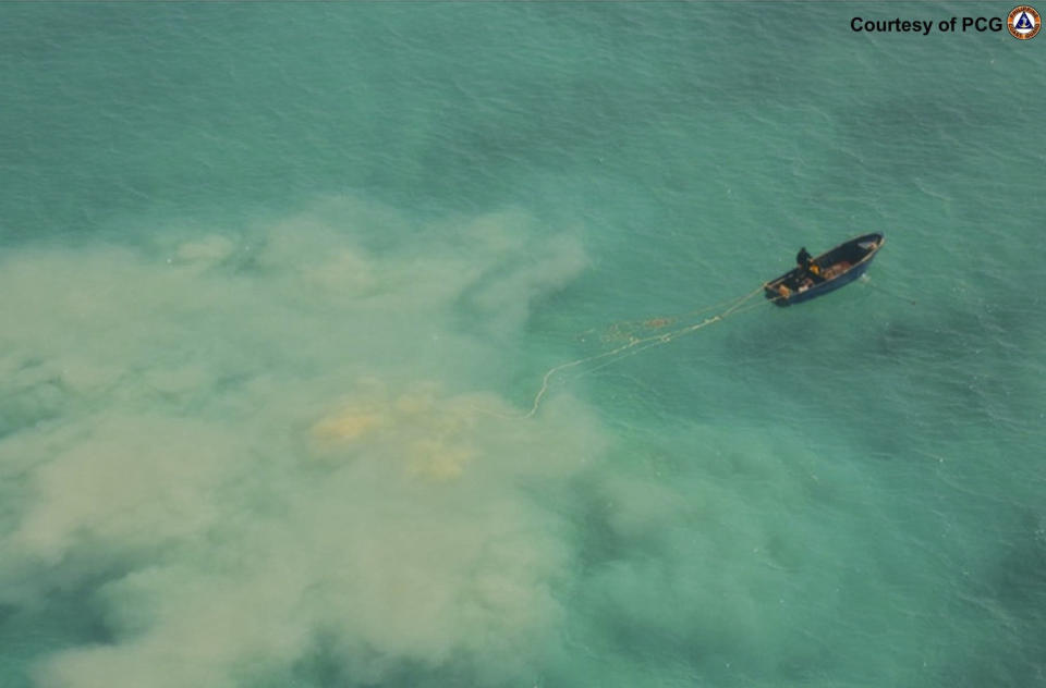 In this April 22, 2019 handout photo provided by the Philippine Coast Guard, Chinese service boats scour the seabed as they search for giant clams in the Scarborough shoal, at the disputed South China Sea, the Philippine Coast Guard said. The Philippines blamed Chinese fishermen on Monday May 20, 2024 for the massive loss of giant clams in a disputed shoal fiercely guarded by Beijing's coast guard in the South China Sea and demanded an international inquiry to determine the extent of environmental damage in the far-flung fishing atoll. (Philippine Coast Guard via AP)